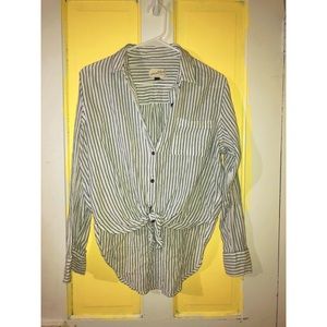 Striped button up shirt.